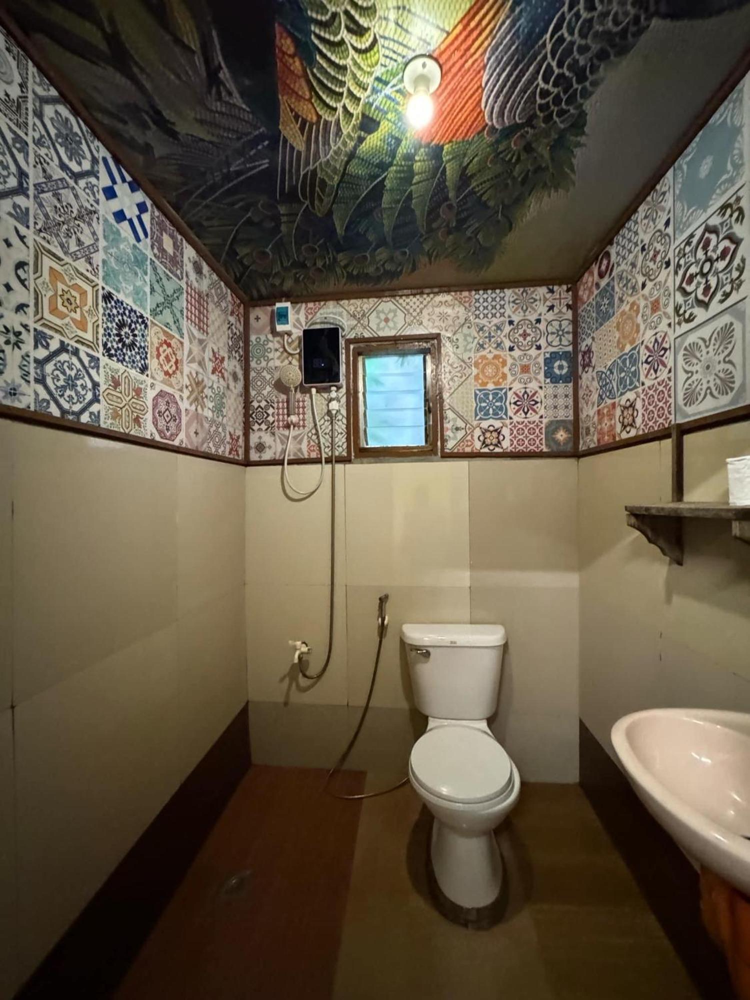 Aquaholik Traveler'S Lodge El Nido Bagian luar foto
